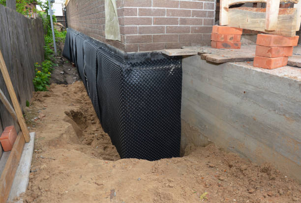 Happy homeowners after waterproofing job in Antioch